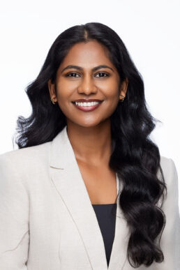 Corporate branding photography Tampa, headshot of female engineer against white background in studio setting on location in Tampa, Florida.