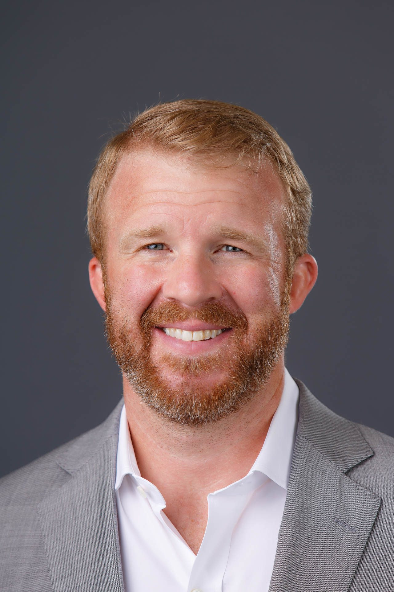 Corporate headshot with gray background - Business Portraits Tampa Bay by Carver Mostardi Photography.