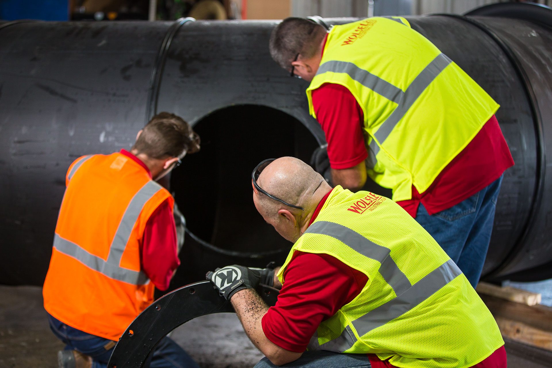 Assembling large HDPE piping section at the Wolseyley Industrial Group, Industrial photography Lakeland, Florida by Tampa based commercial photographer Carver Mostardi.