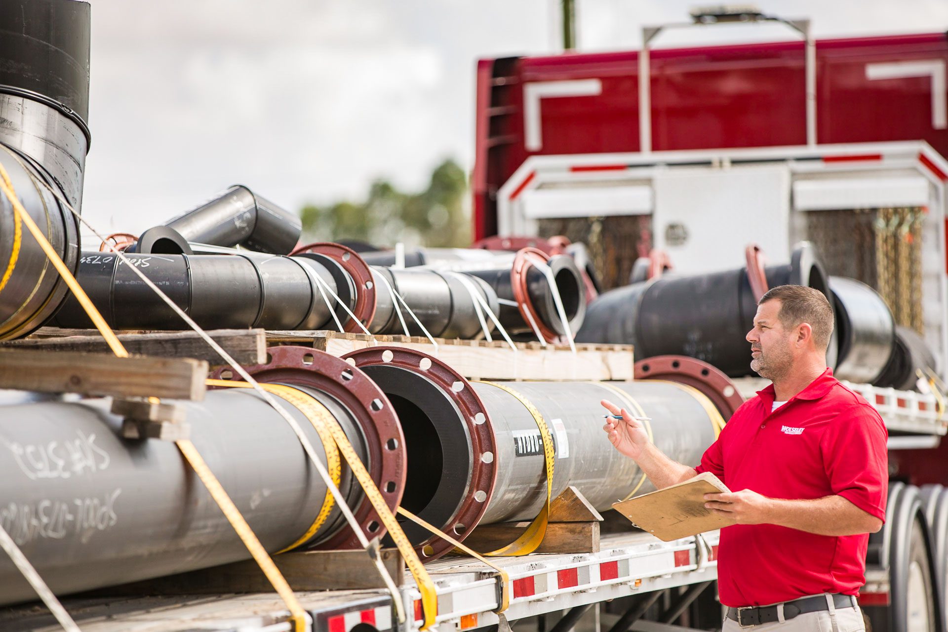 Counting pipes before shipping at The Wolseyley Industrial Group, Industrial photography Lakeland, Florida by Tampa based commercial photographer Carver Mostardi.