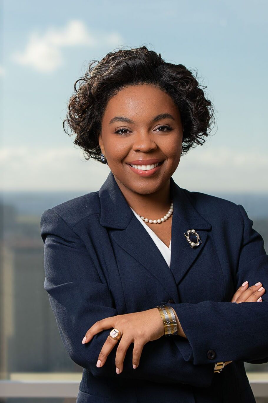 Tampa corporate photographer creating professional attorney headshot in modern office environment.