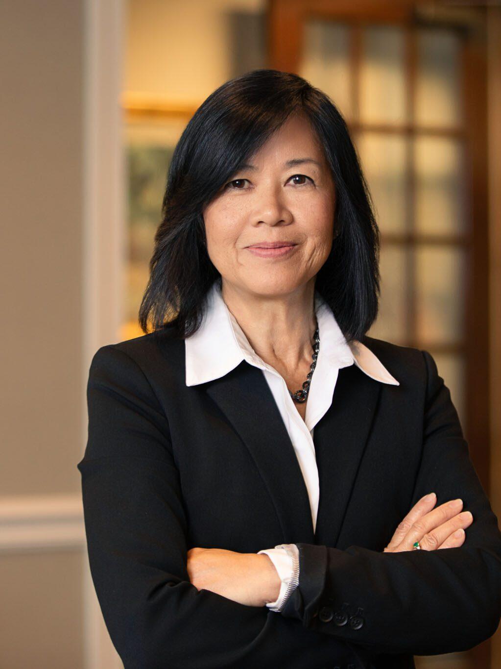Tampa corporate photographer capturing executive portrait of businesswoman in modern office environment.