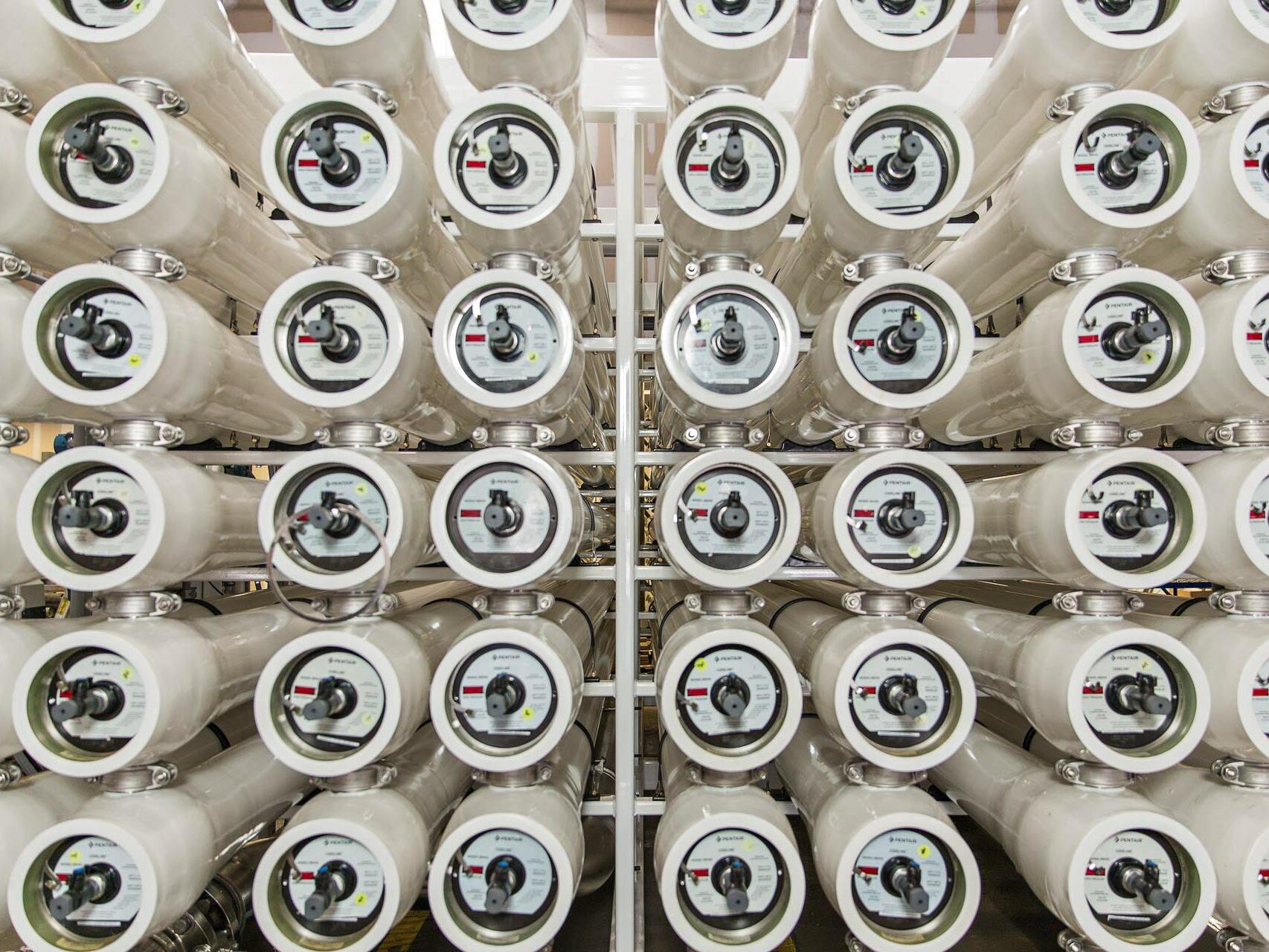 Water filtration system photographed on-location at Tampa facility - commercial industrial photography.