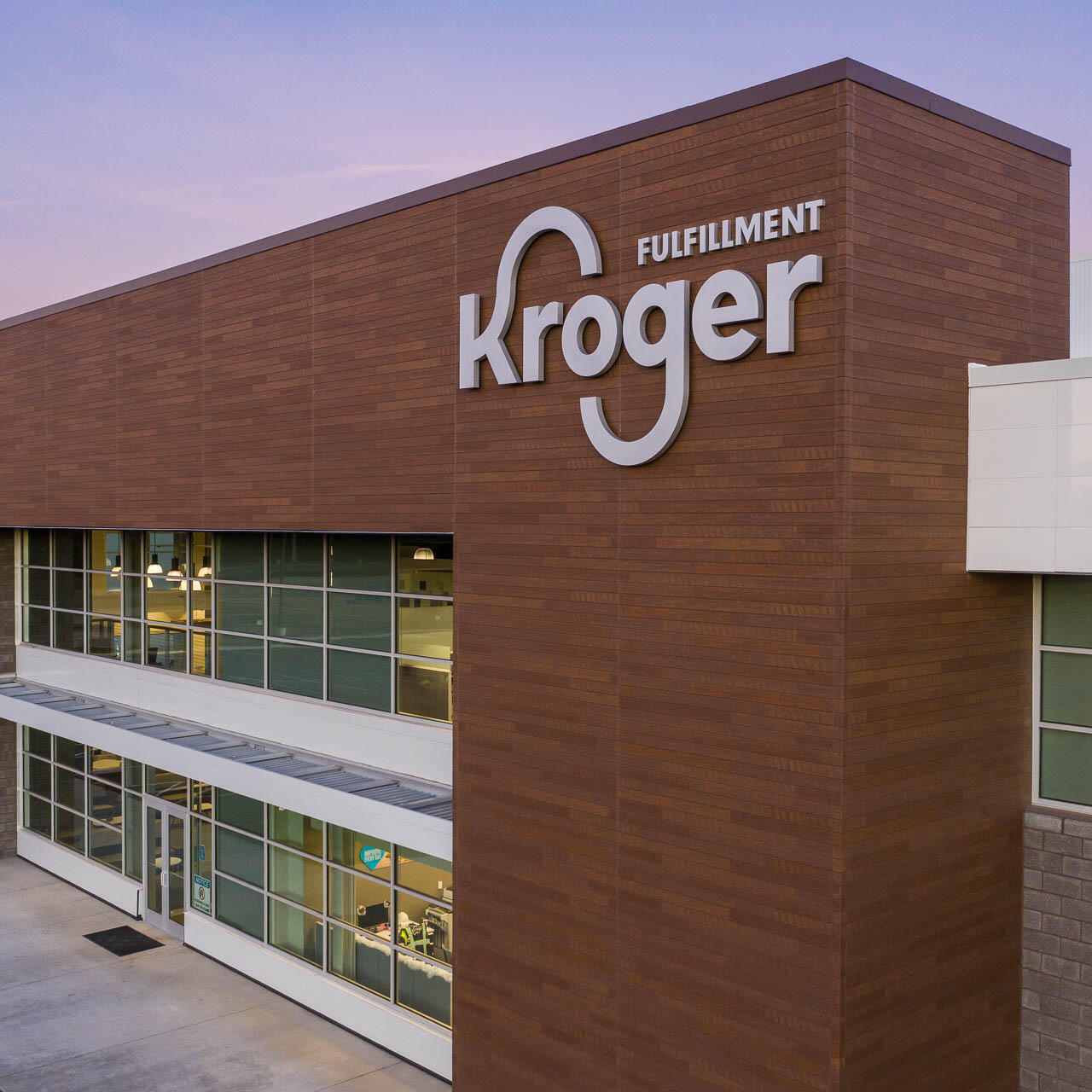 Aerial architectural photograph of the Kroger fulfillment center and distribution facility at dusk near Atlanta, Georgia.