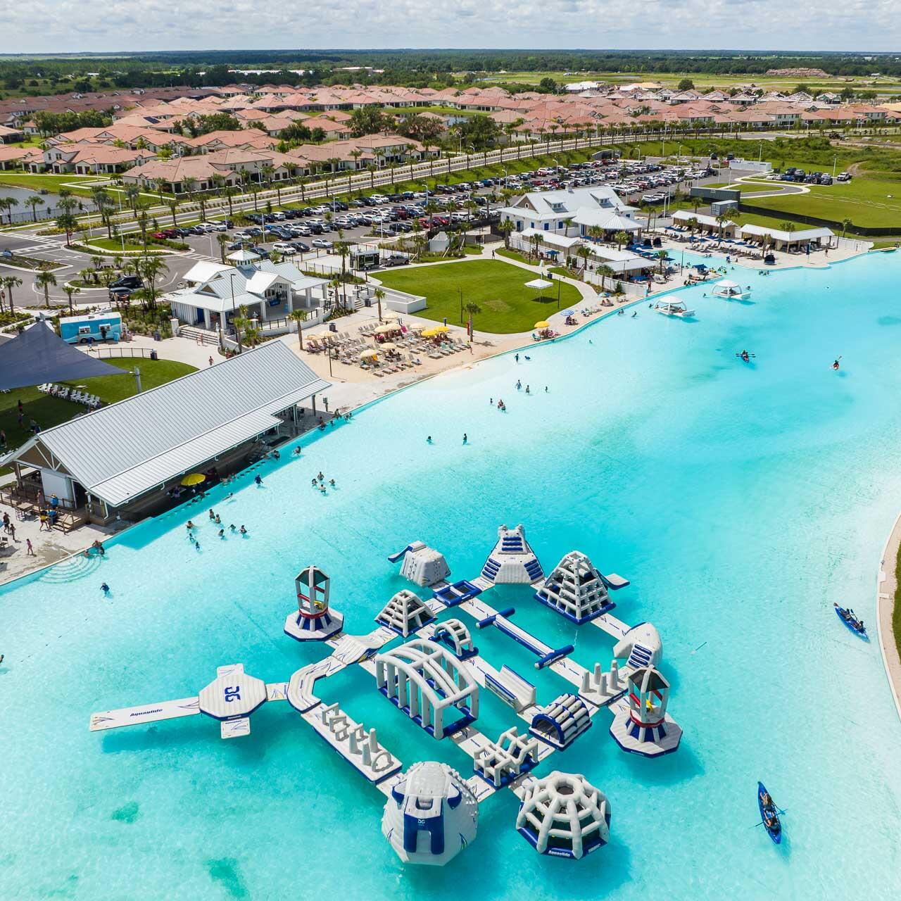 Aerial drone photograph of a manmade lagoon and waterfront community near Tampa, Florida.
